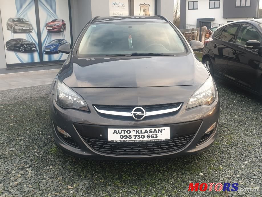 2014' Opel Astra Karavan photo #3