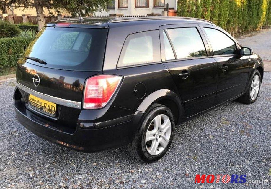 2009' Opel Astra Karavan photo #1