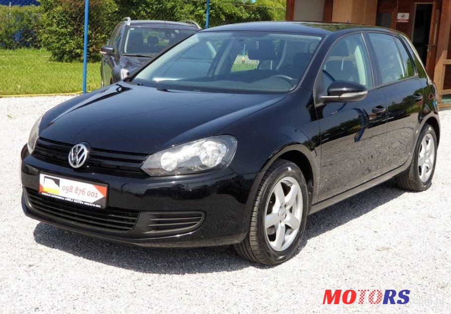 2012' Volkswagen Golf VI 1,6 Tdi photo #1