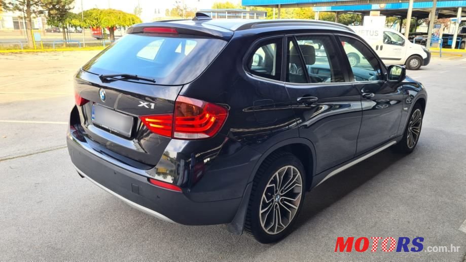 2011' BMW X1 Xdrive23D photo #3