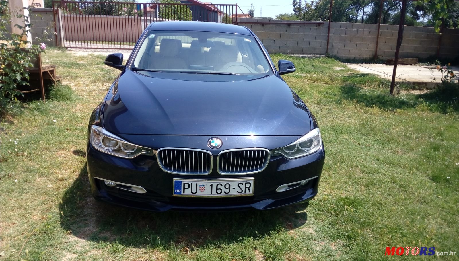 2013' BMW 3 Series photo #1