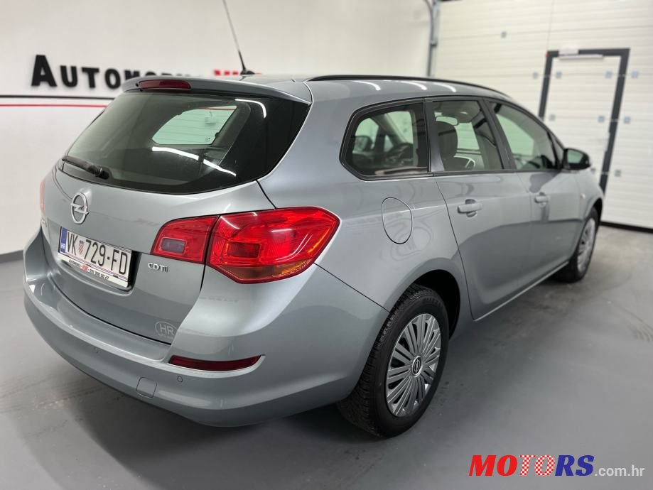 2011' Opel Astra Karavan photo #6