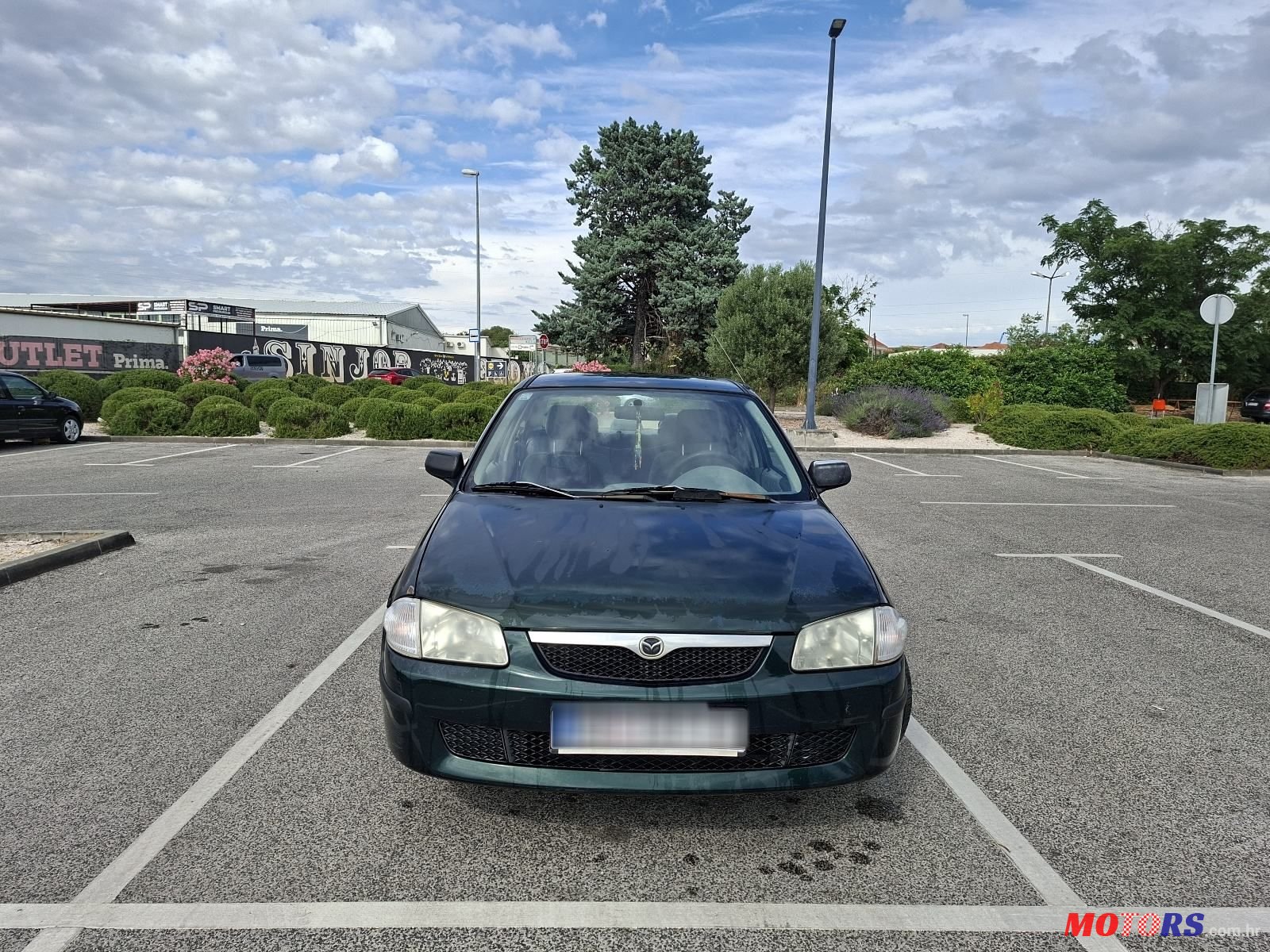 1999' Mazda 323 1.3 Ce 4T photo #1