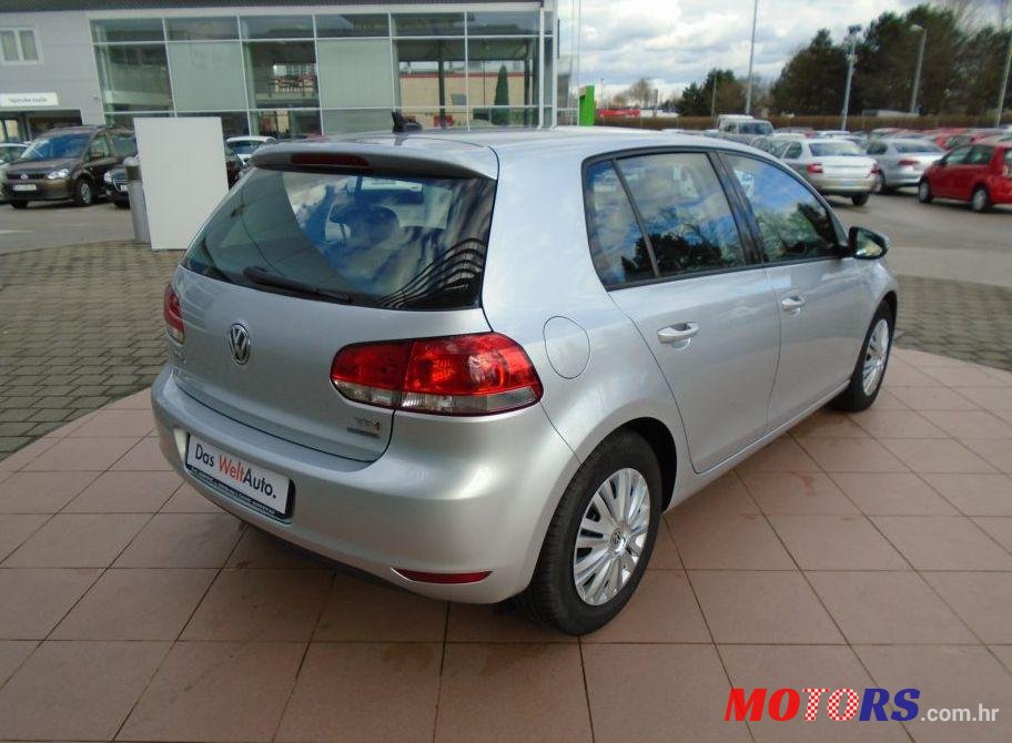 2011' Volkswagen Golf VI 1,6 Tdi photo #1
