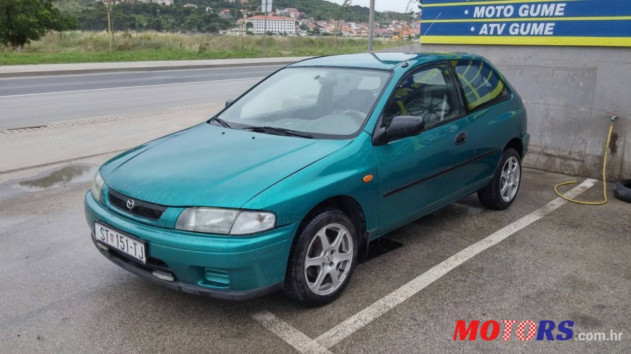 2000' Mazda 323 photo #1