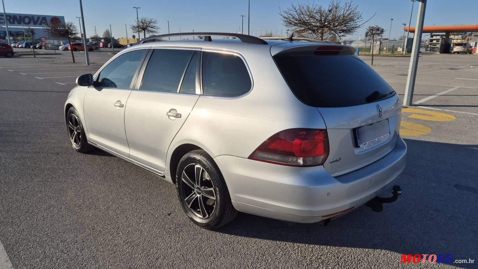 2011' Volkswagen Golf VI Variant photo #3