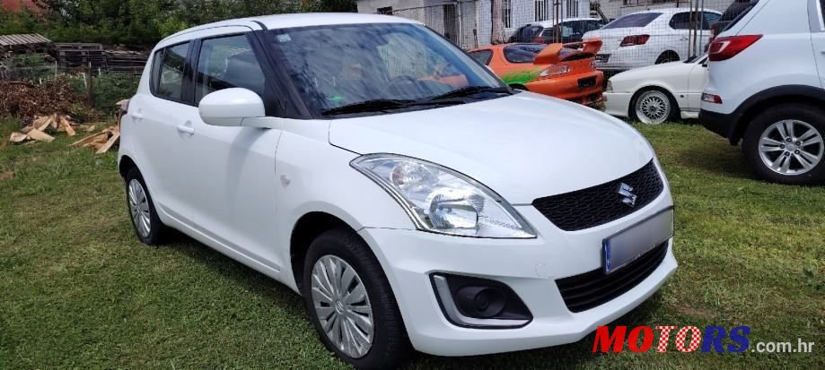 2013' Suzuki Swift 1,3 photo #3