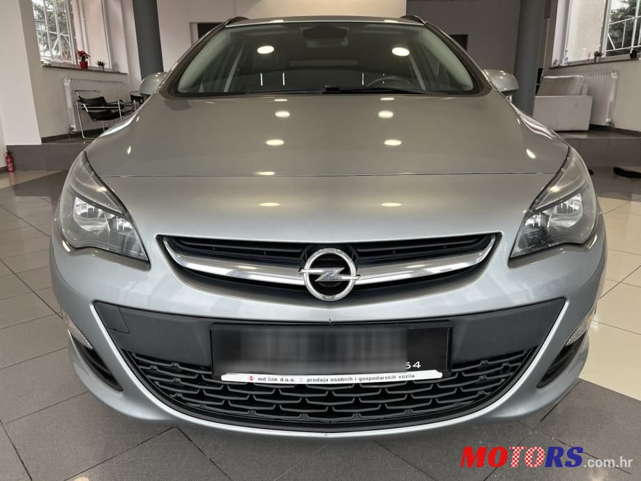 2015' Opel Astra Karavan photo #2