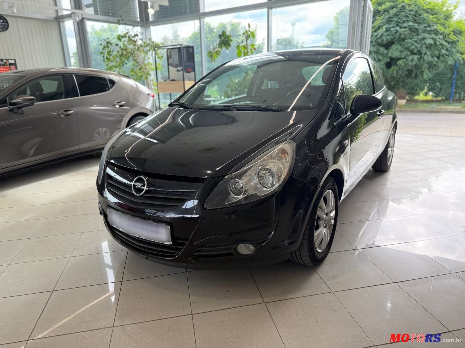 2010' Opel Corsa 1.4 Color Edition photo #3