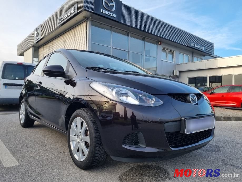 2009' Mazda 2 1,3 I Te photo #1