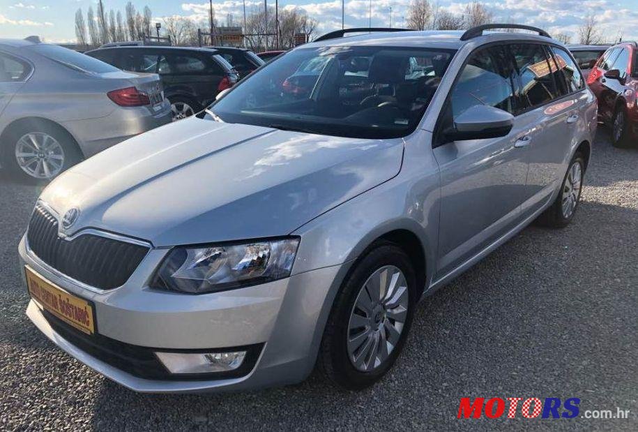 2014' Skoda Octavia Combi 1,6 Tdi photo #1