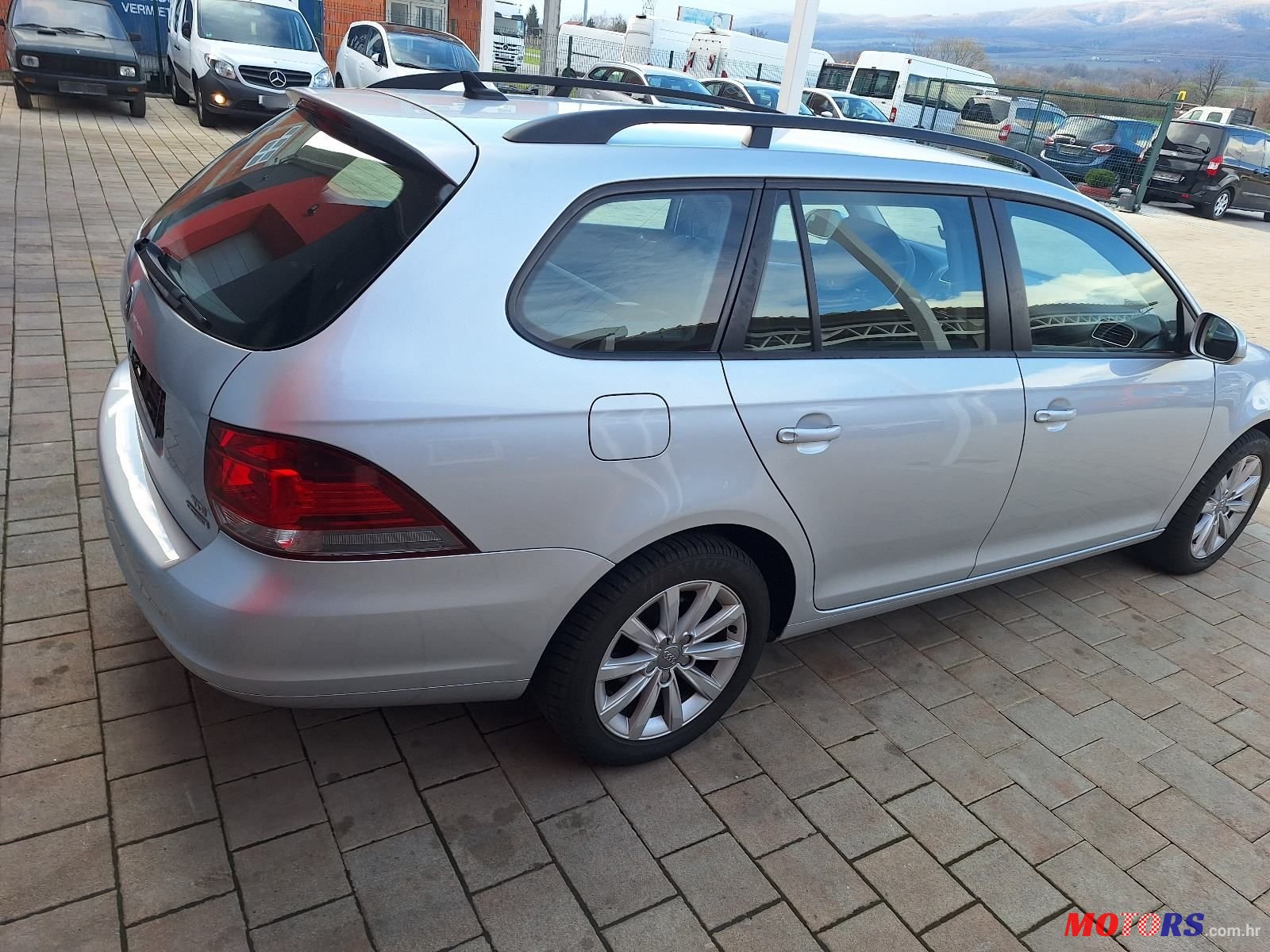 2011' Volkswagen Golf VI Variant photo #6