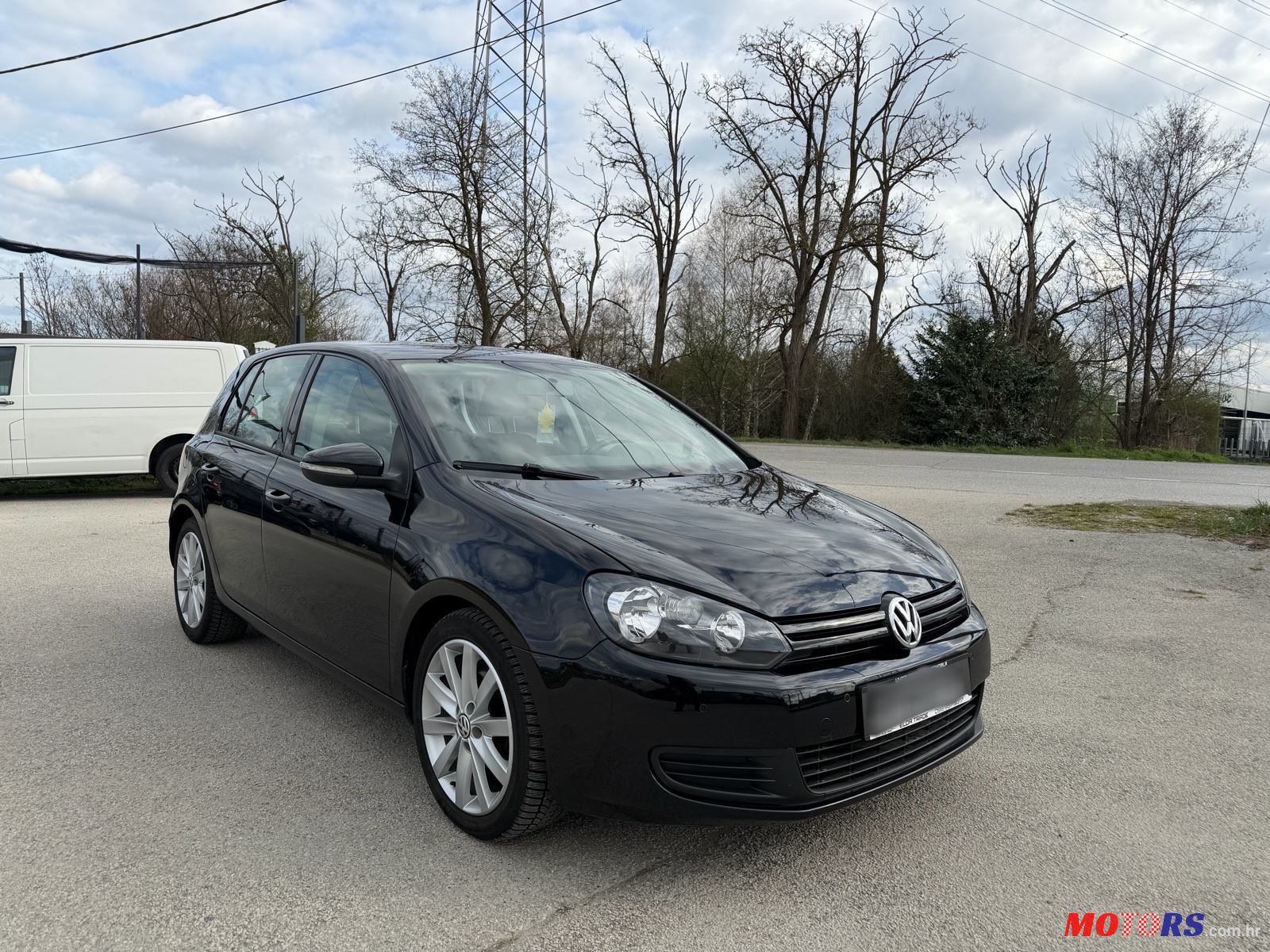 2009' Volkswagen Golf VI 1,6 Tdi photo #2