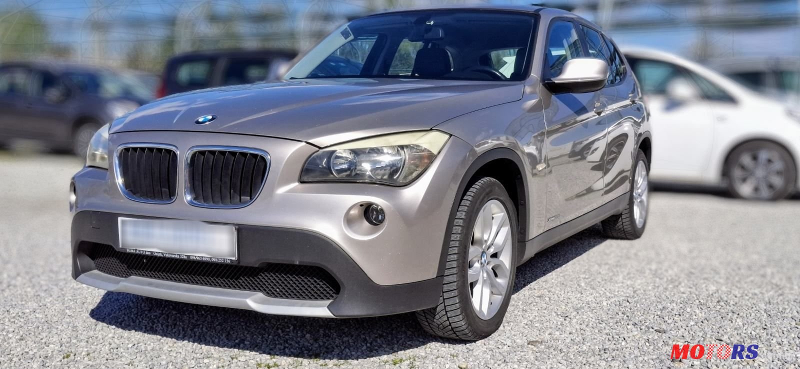 2011' BMW X1 Xdrive18D photo #1