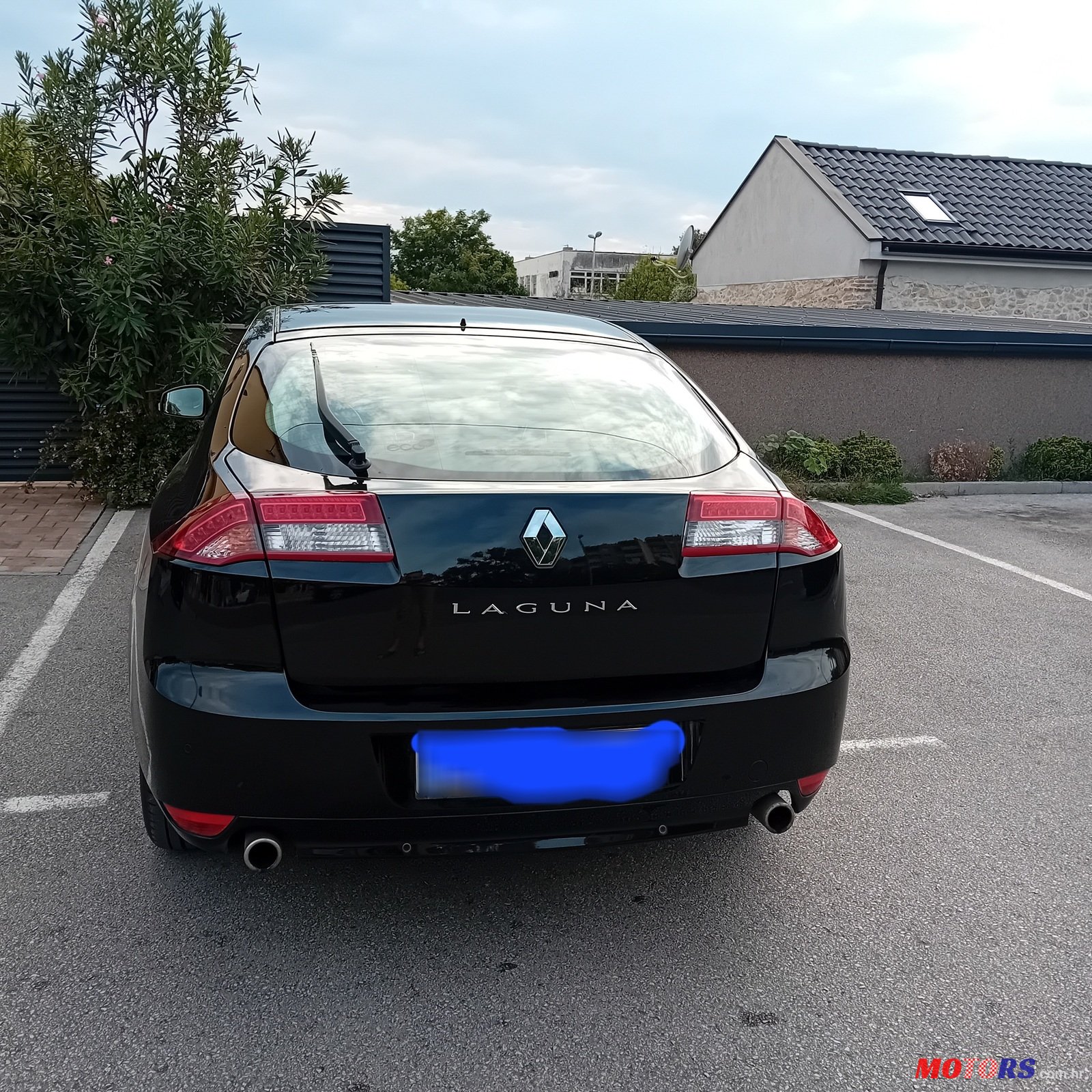 2011' Renault Laguna 2.0dci photo #2