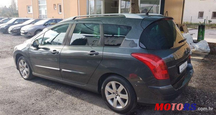 2012' Peugeot 308 Sw photo #1