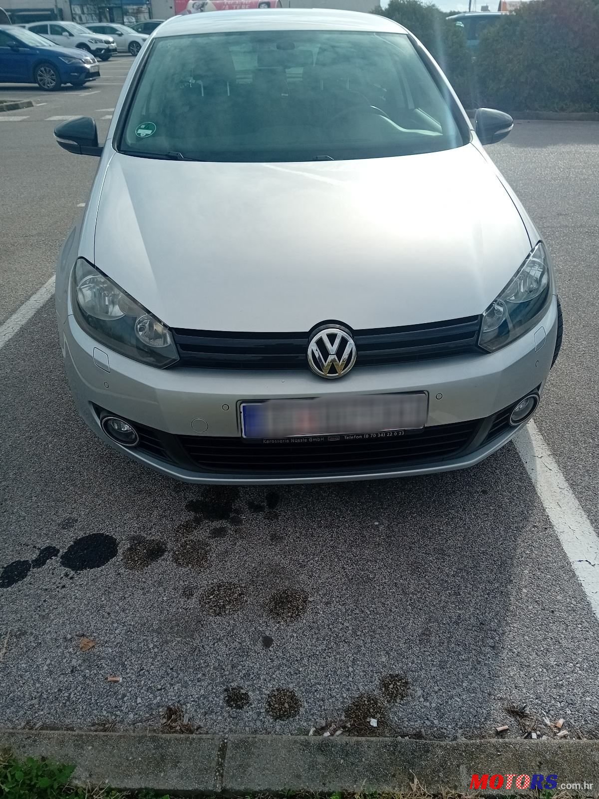 2012' Volkswagen Golf VI 1,6 Tdi photo #5