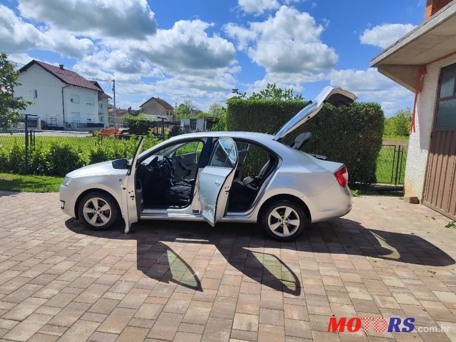 2014' Skoda Rapid 1,6 Tdi photo #6