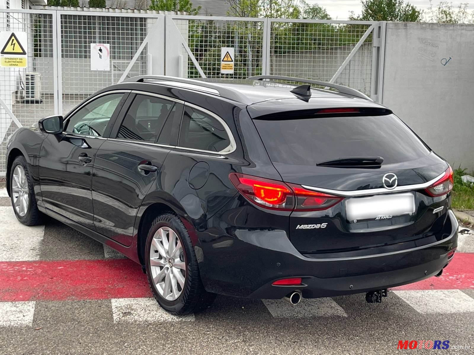 2015' Mazda 6 Sport Combi photo #4