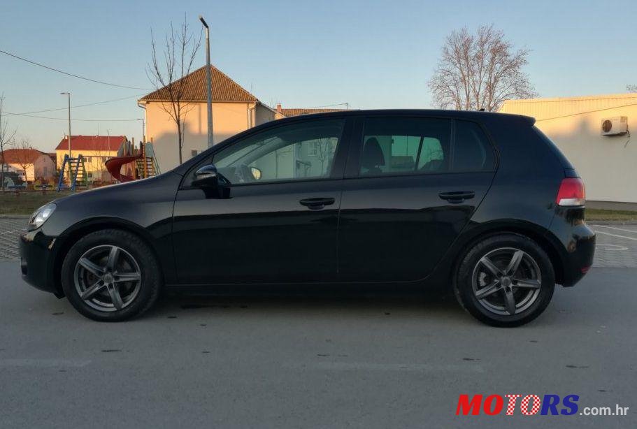2011' Volkswagen Golf VI 1,6 Tdi photo #1