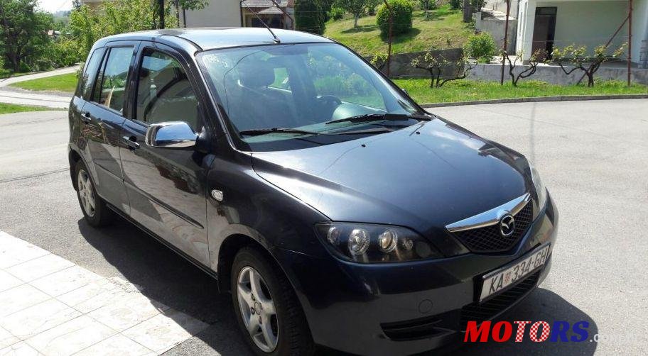 2007' Mazda 2 1,4 I Gt photo #1