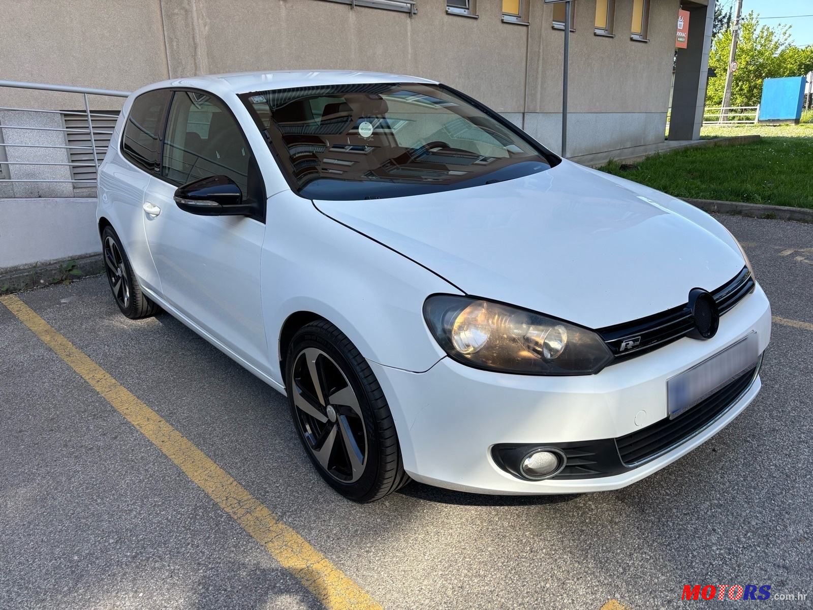 2012' Volkswagen Golf VI 1,6 Tdi photo #1