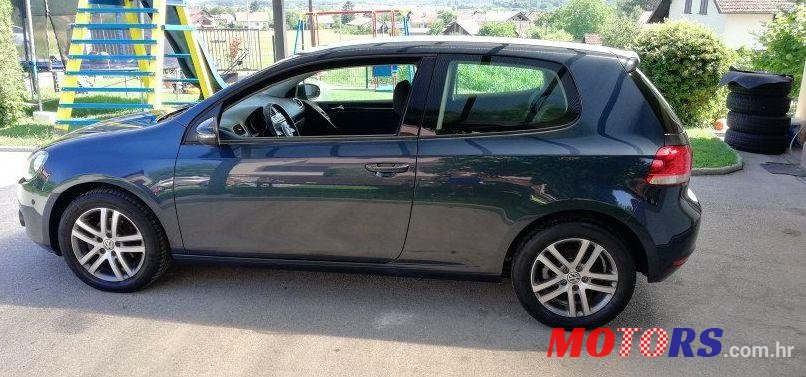 2010' Volkswagen Golf VI 1,6 Tdi photo #1