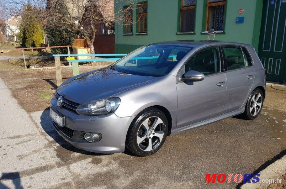 2011' Volkswagen Golf VI 1,6 Tdi photo #1