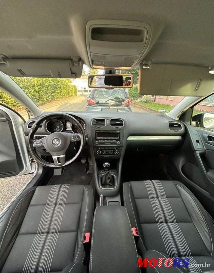 2012' Volkswagen Golf VI 1,6 Tdi photo #2