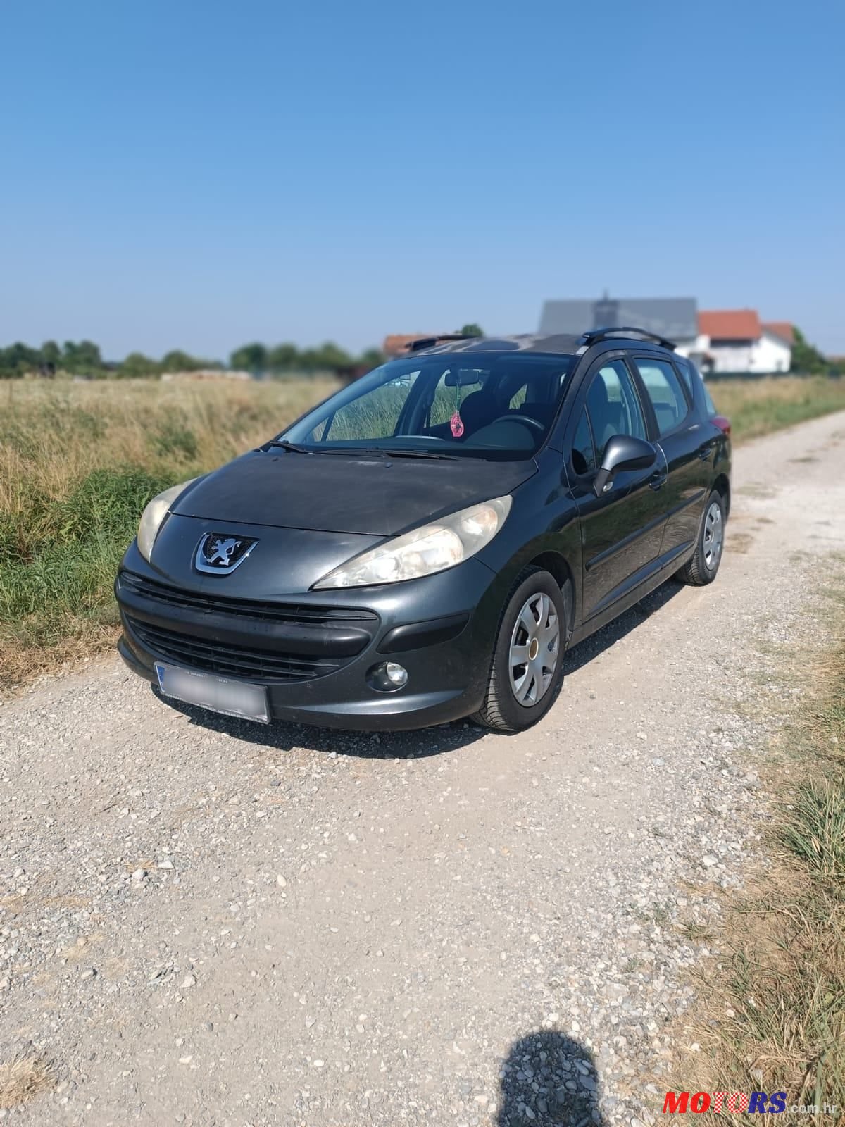 2008' Peugeot 207 Sw photo #1