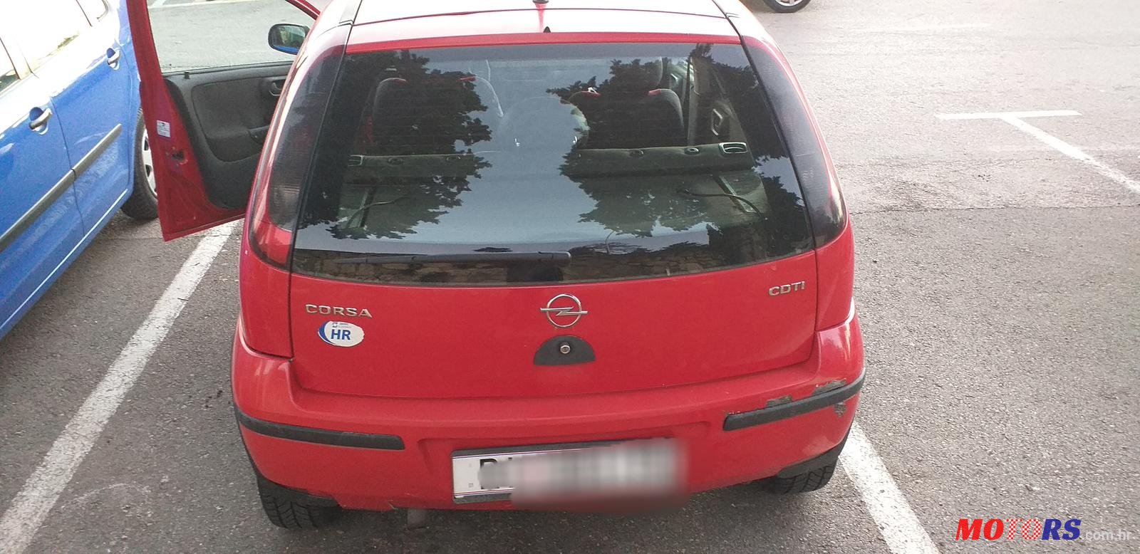 2004' Opel Corsa photo #3