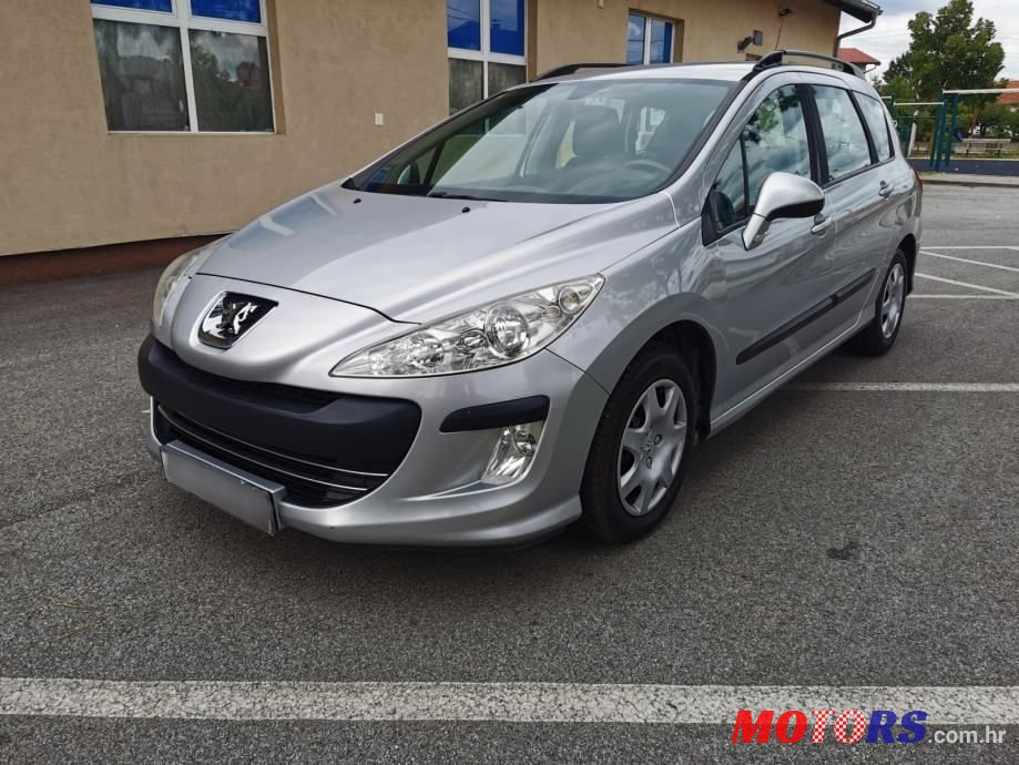 2011' Peugeot 308 Sw photo #1