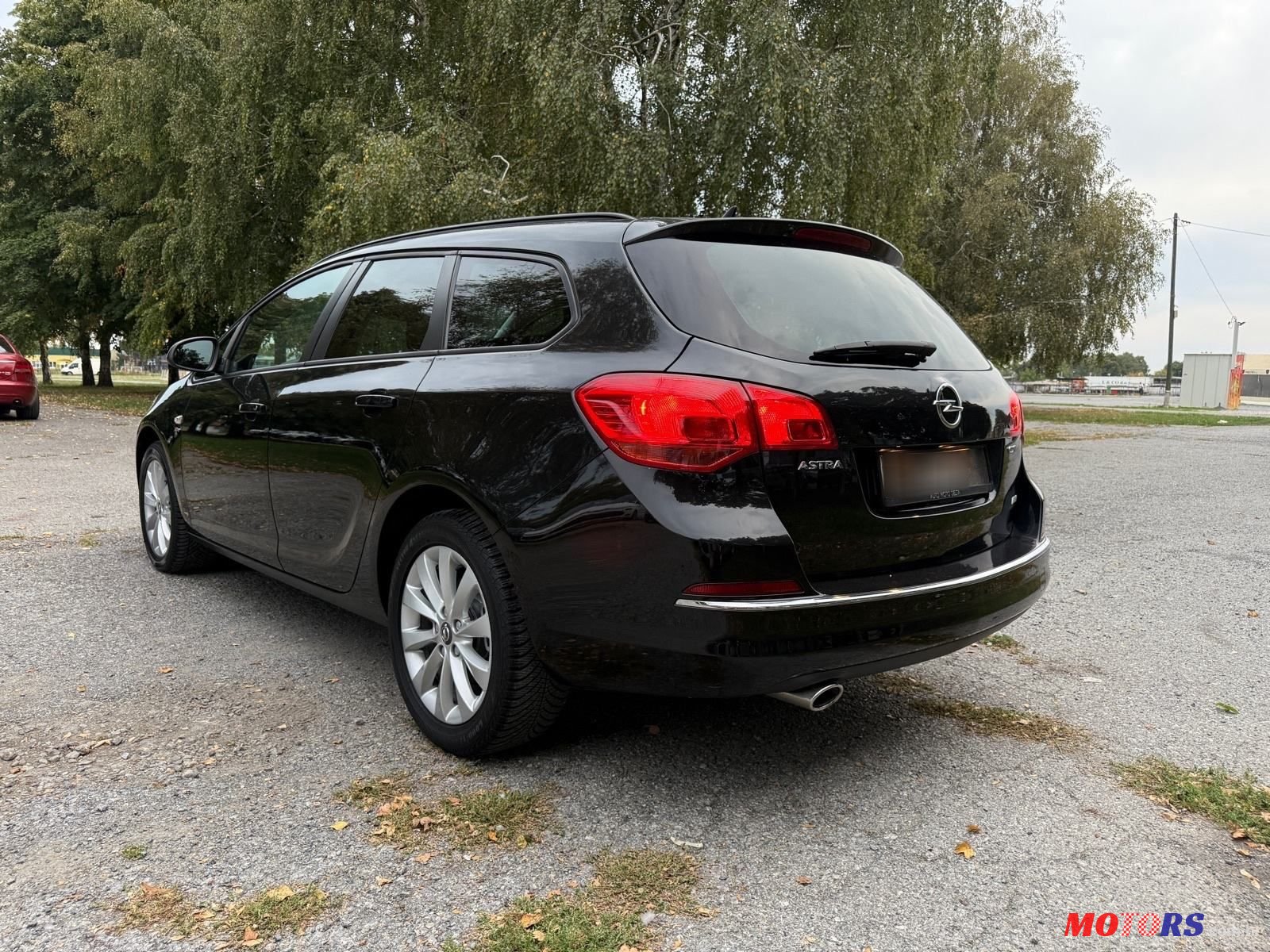 2013' Opel Astra Karavan photo #3