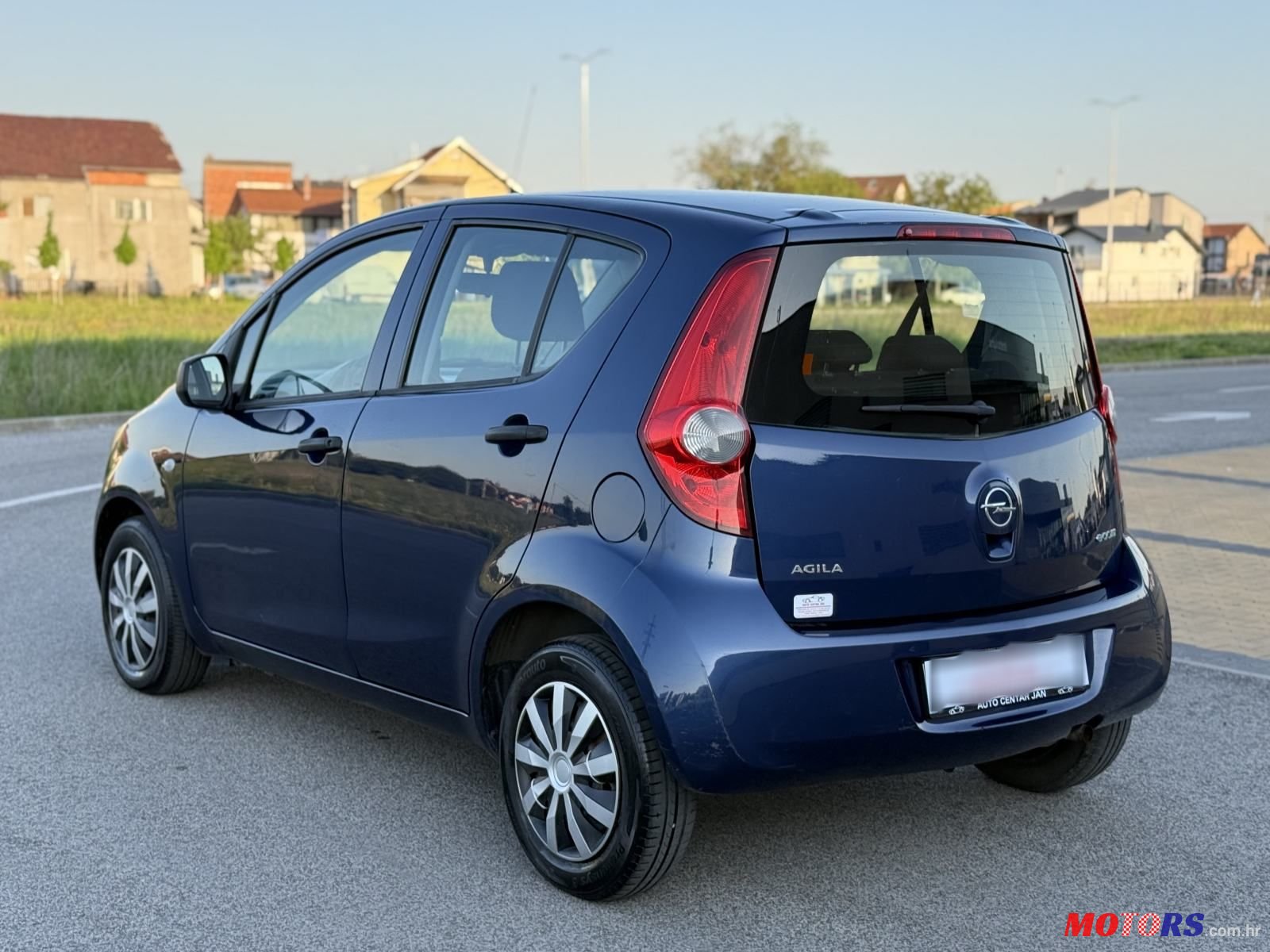 2009' Opel Agila 1,0 photo #4