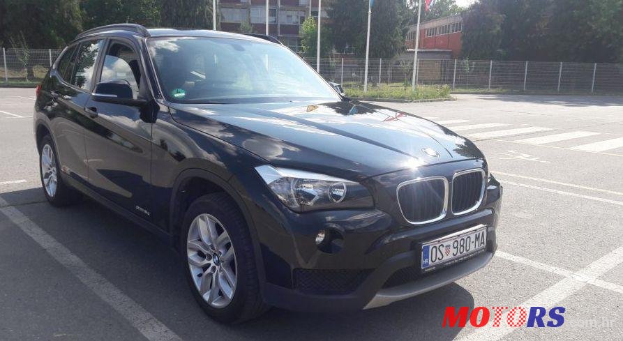 2012' BMW X1 Sdrive16D photo #1