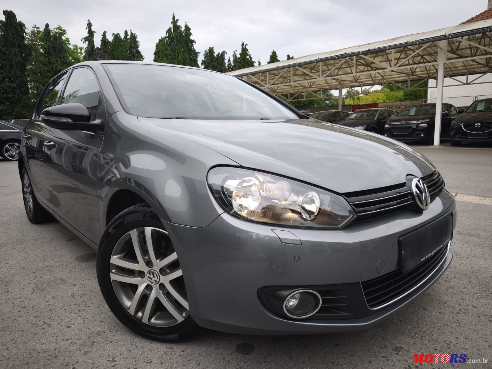 2012' Volkswagen Golf VI 1,6 Tdi photo #2