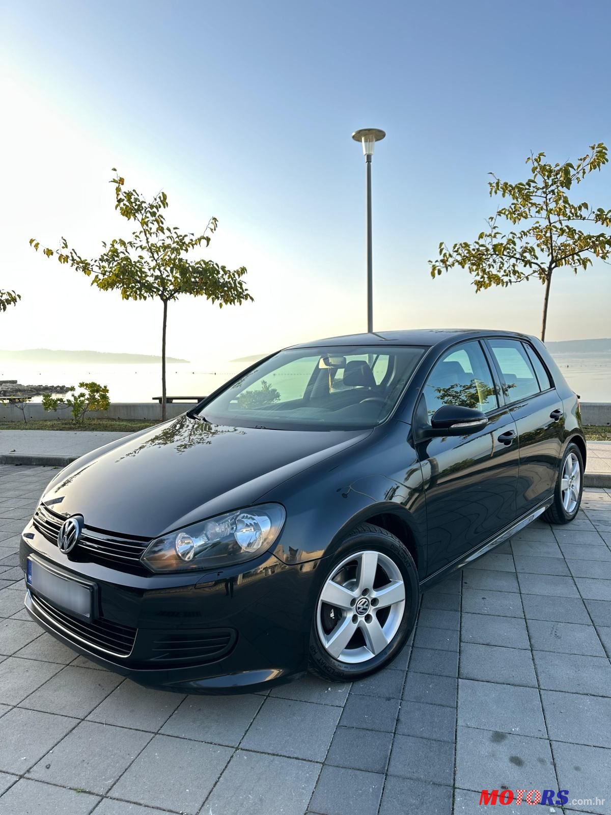 2012' Volkswagen Golf VI 1,6 Tdi photo #1
