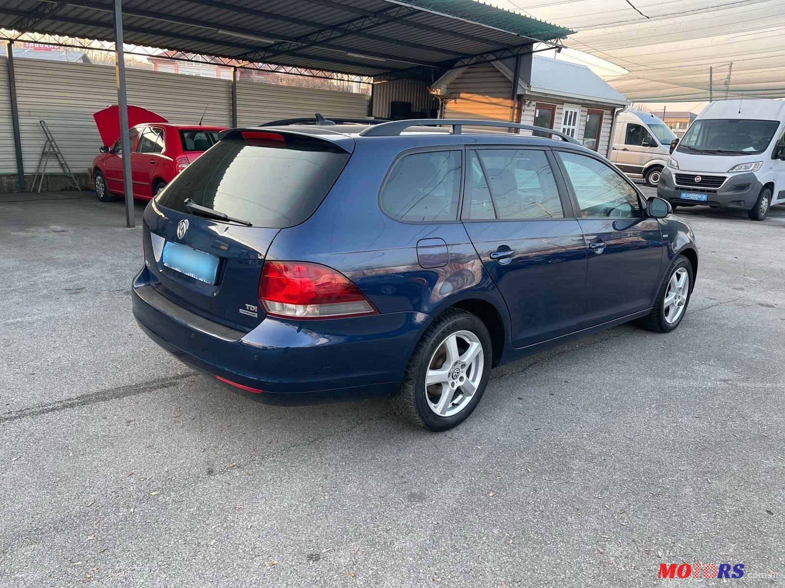 2012' Volkswagen Golf VI Variant photo #5