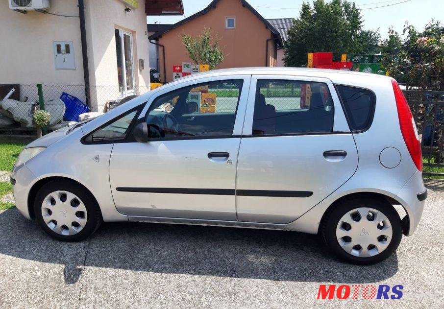 2005' Mitsubishi Colt 1,1 photo #1
