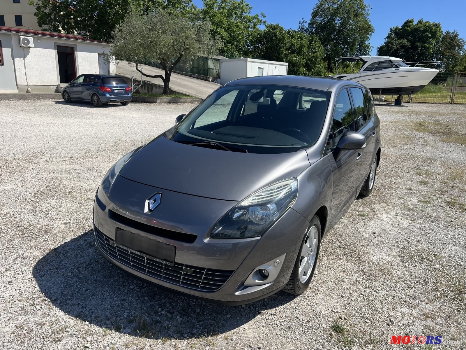 2009' Renault Scenic 1,5 Dci photo #1