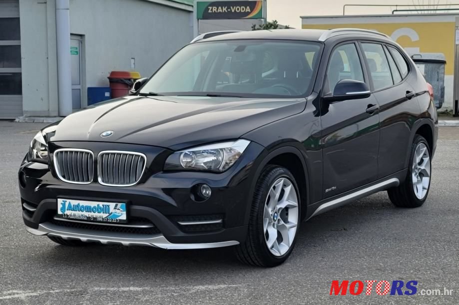 2014' BMW X1 Sdrive18D photo #3