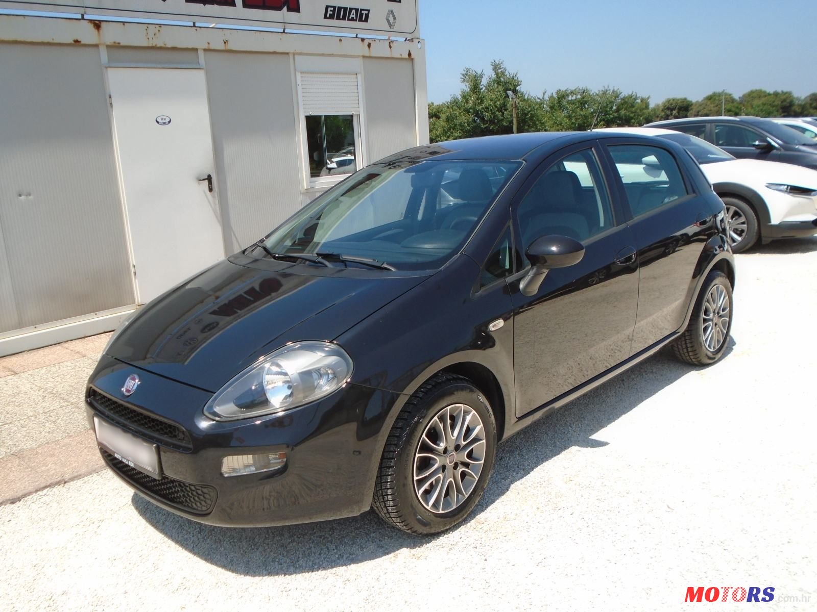 2012' Fiat Punto 1,3 Multijet 16V photo #1