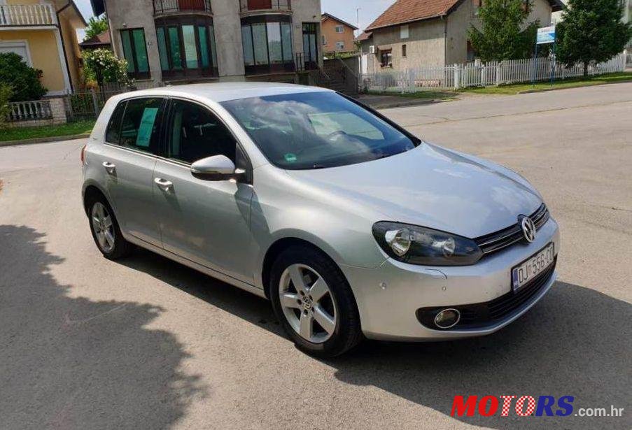 2011' Volkswagen Golf VI 1,6 Tdi photo #1