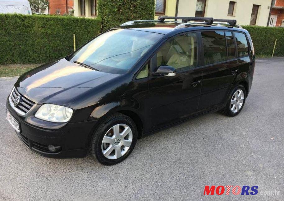 2004' Volkswagen Touran 2,0 Tdi photo #1