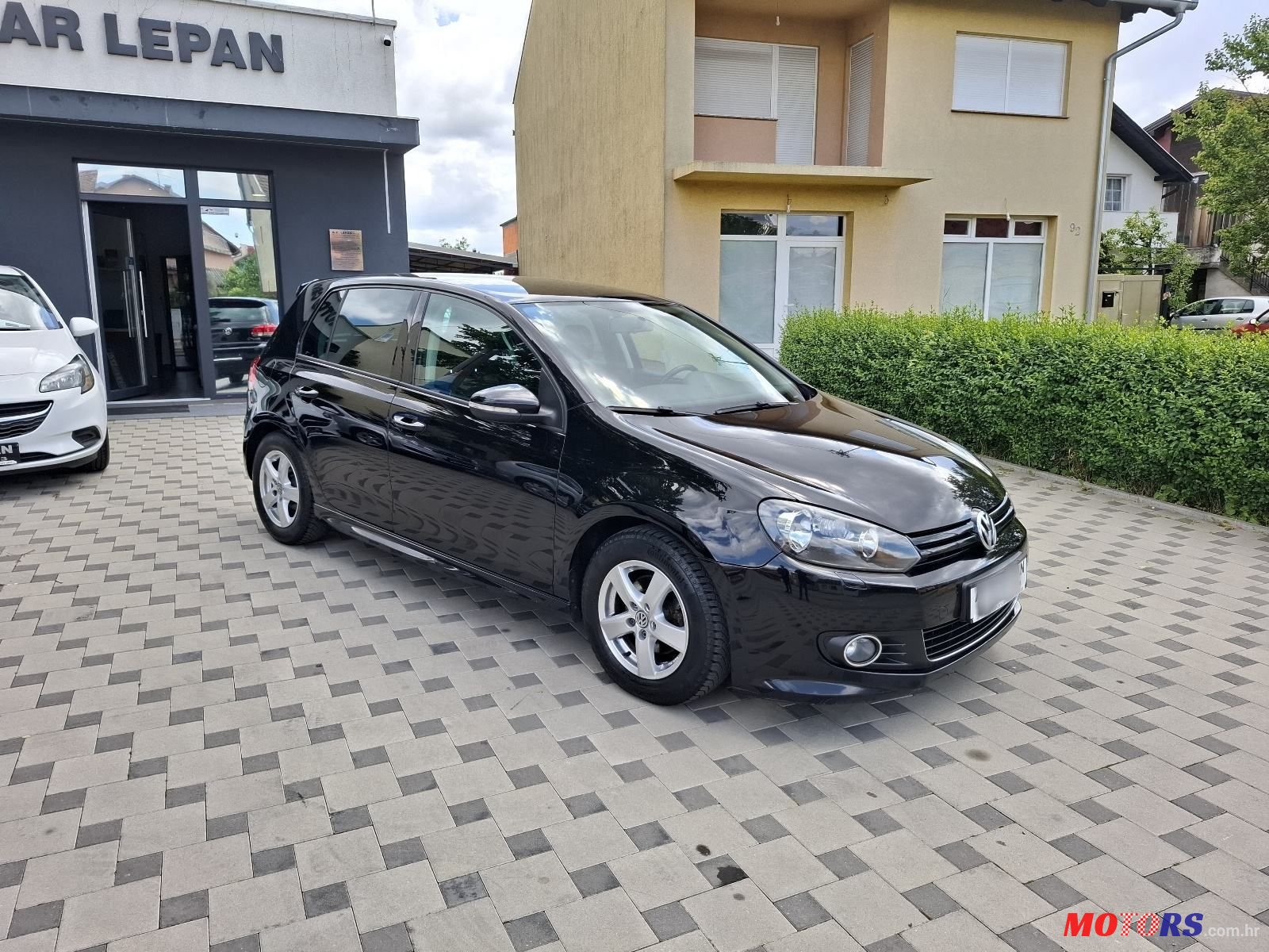 2011' Volkswagen Golf VI 1,6 Tdi photo #2