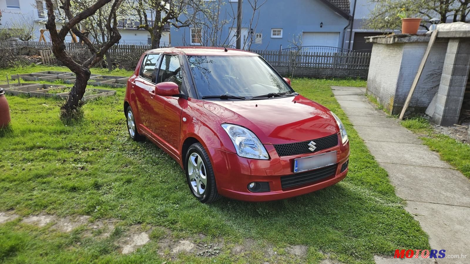 2005' Suzuki Swift 1,3 Glx photo #1