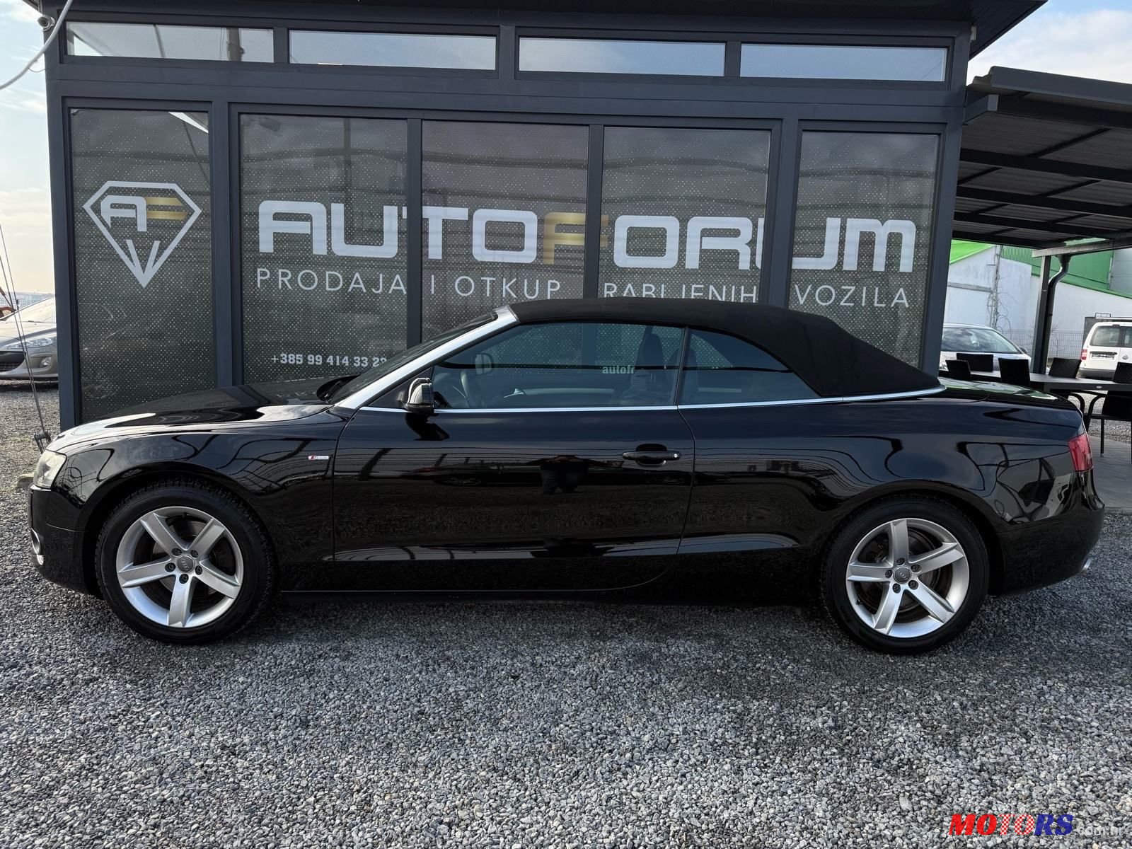 2011' Audi A5 Cabrio photo #5