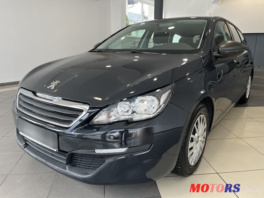 2014' Peugeot 308 Sw photo #1