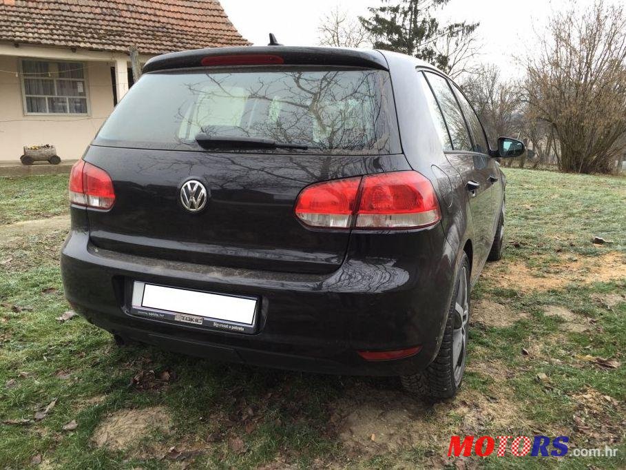 2011' Volkswagen Golf VI 1,6 Tdi photo #1