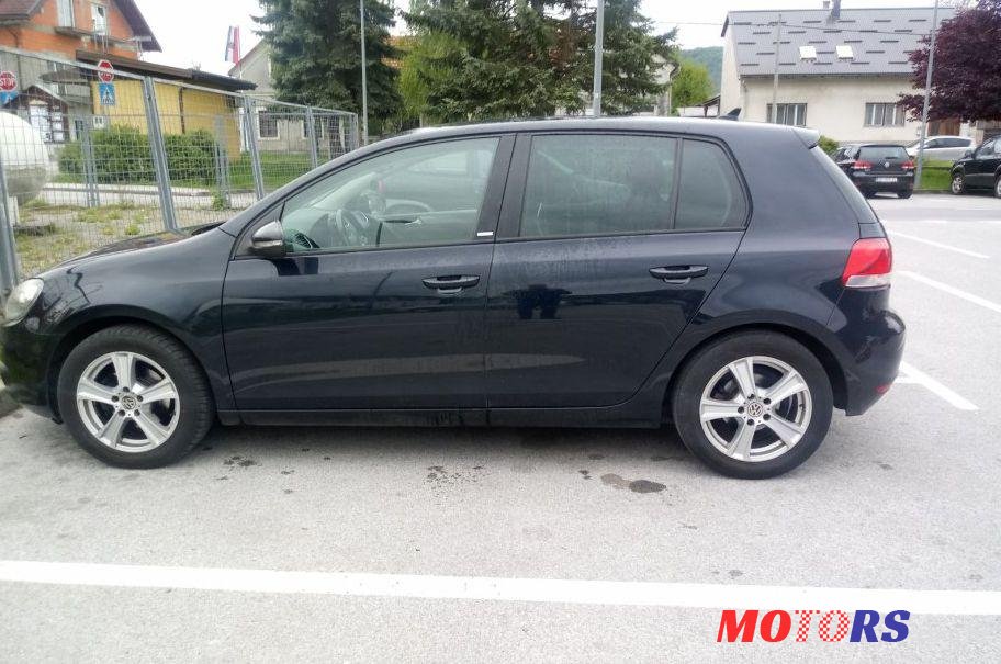 2012' Volkswagen Golf VI 1,6 Tdi photo #1
